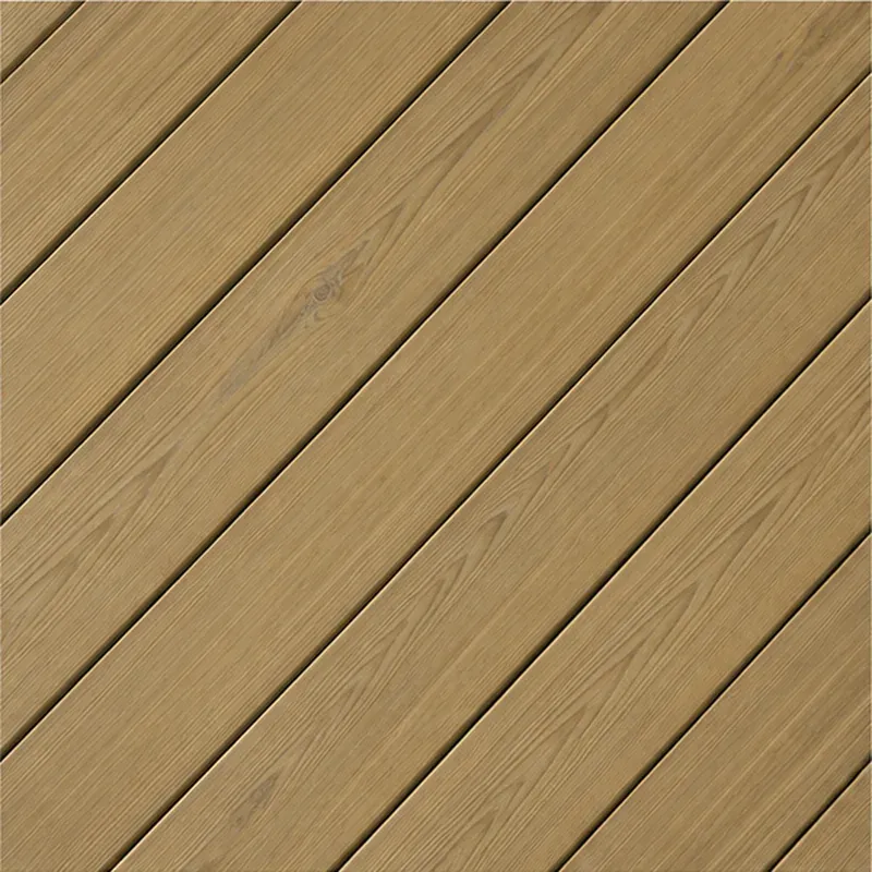 Close-up of light pressure-treated deck boards laid diagonally