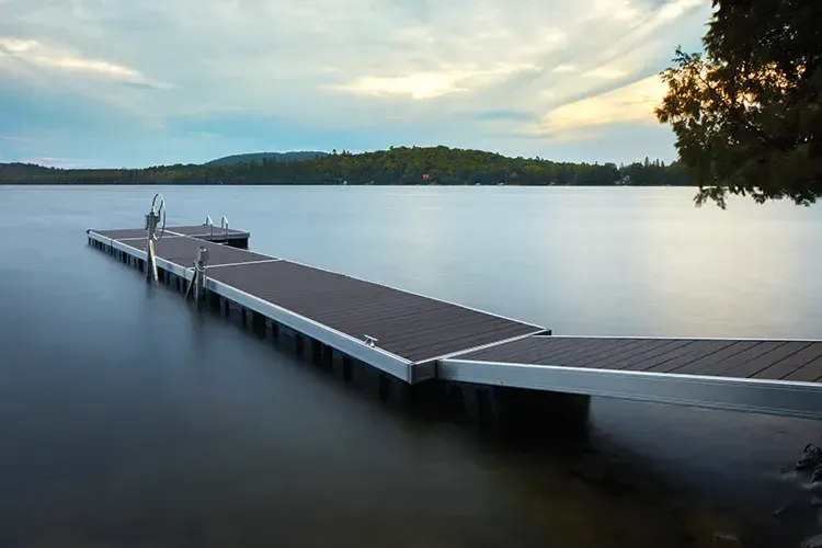 TimberTech Advanced PVC deck boards used on a waterfront dock beside open water