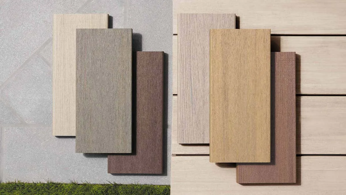TimberTech deck boards in brown, tan, and grey tones laid next to and on top of each other